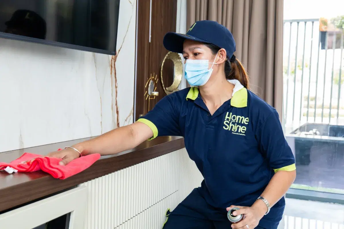 Wiping down the media console before check-in